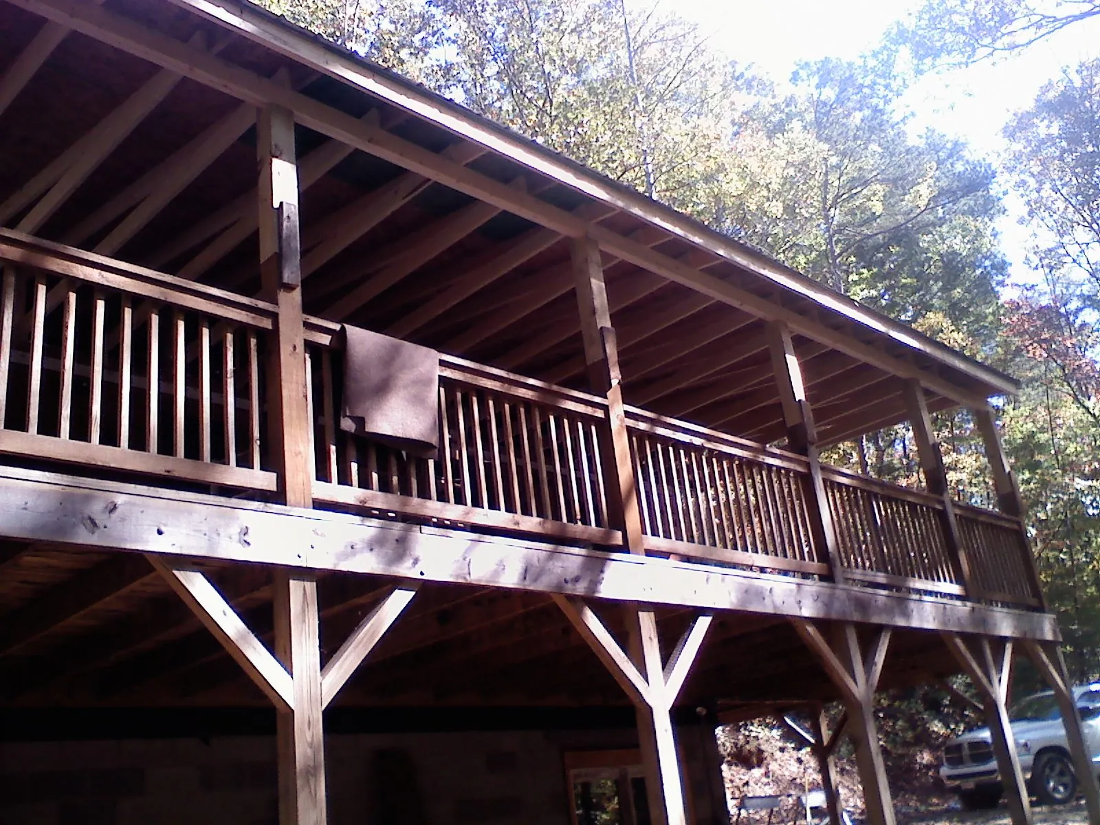 Timber framing under a new elevated porch and deck — Roof Leak Repair in Youngsville by Roofing Brothers
